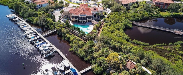 birds eye view of property featuring a water view