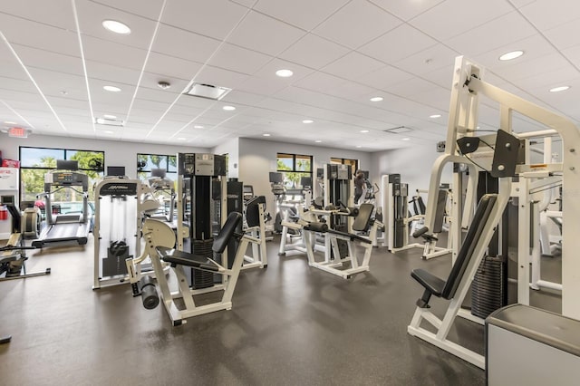 gym featuring a paneled ceiling