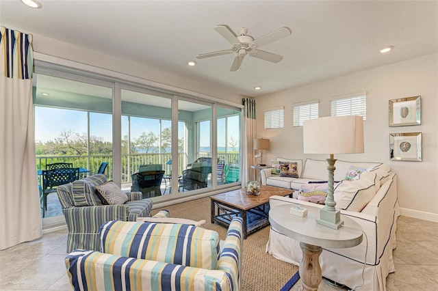 tiled living room featuring ceiling fan