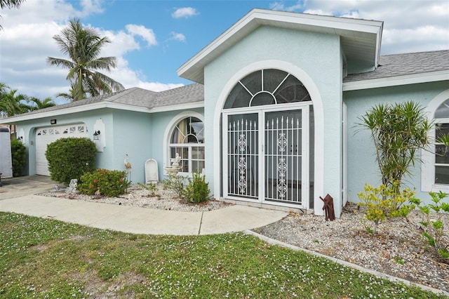 property entrance featuring a garage