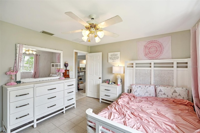 bedroom featuring ceiling fan and light tile patterned flooring