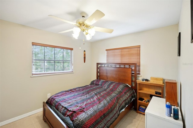 bedroom featuring ceiling fan and light tile patterned floors