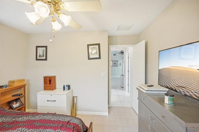 tiled bedroom with ceiling fan