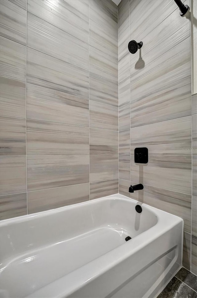 bathroom featuring  shower combination