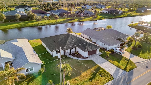 drone / aerial view with a water view