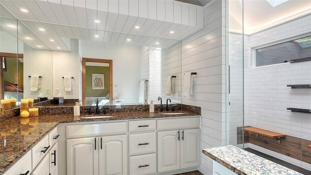 bathroom with vanity and a skylight