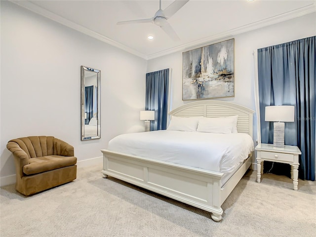 bedroom with carpet flooring, ceiling fan, and ornamental molding