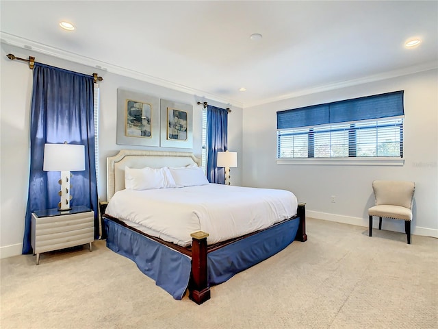 carpeted bedroom featuring crown molding