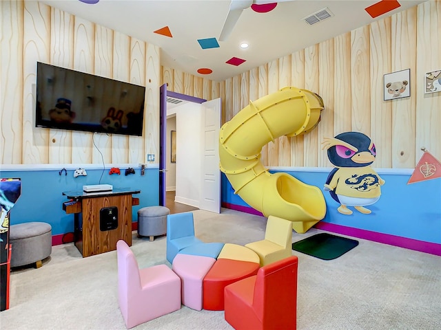 rec room with light carpet