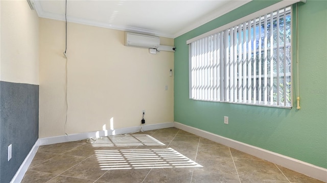 empty room featuring an AC wall unit and crown molding