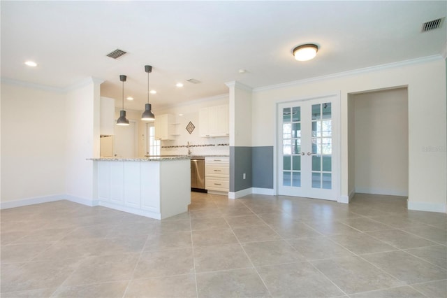 kitchen featuring hanging light fixtures, crown molding, french doors, white cabinetry, and stainless steel dishwasher