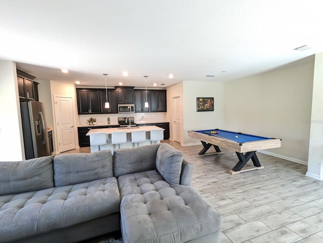 recreation room with sink and pool table