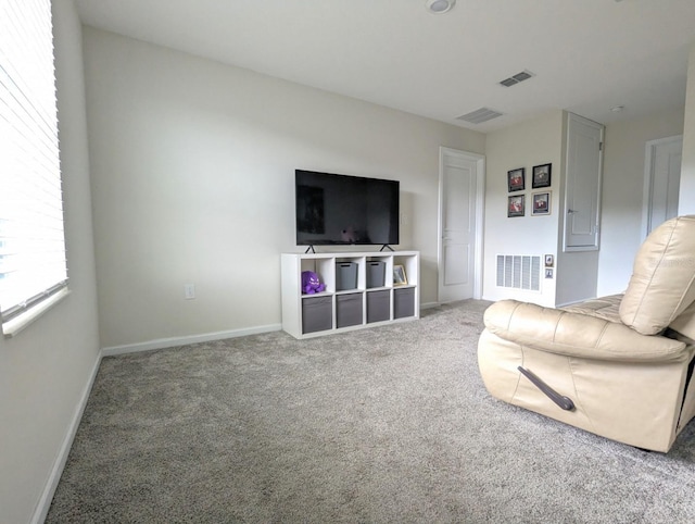 unfurnished living room with carpet