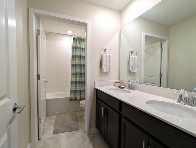 full bathroom featuring tile patterned flooring, vanity, shower / bath combination with curtain, and toilet