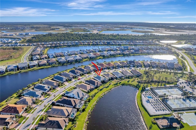 drone / aerial view featuring a water view