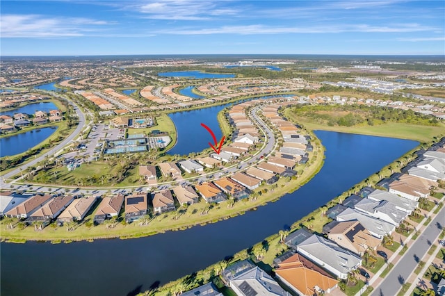 birds eye view of property featuring a water view