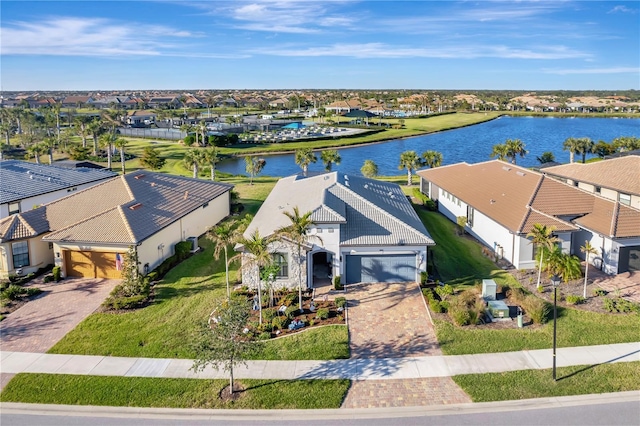 birds eye view of property featuring a water view