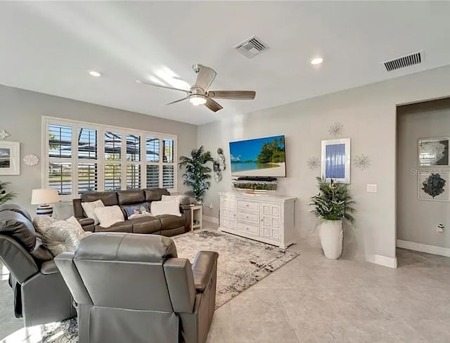 living room featuring ceiling fan