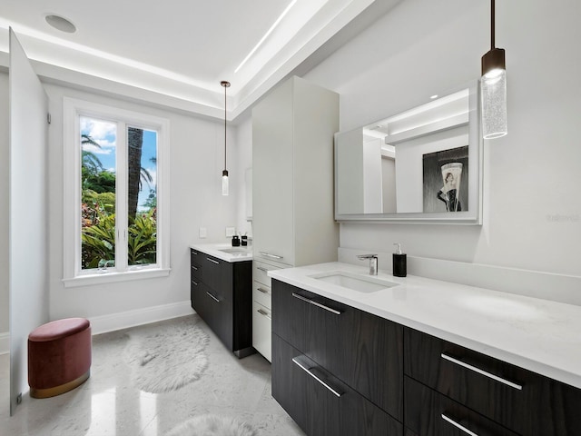 bathroom featuring a wealth of natural light and vanity