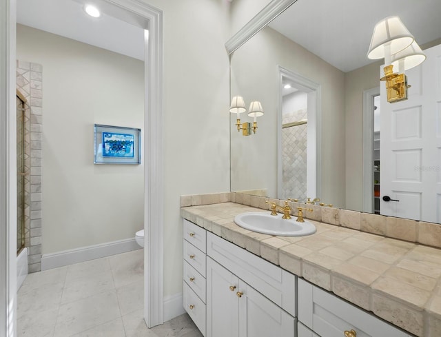 full bathroom with washtub / shower combination, tile patterned floors, vanity, and toilet