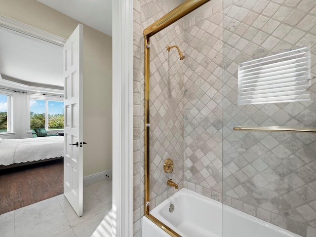 bathroom with tile patterned flooring and enclosed tub / shower combo