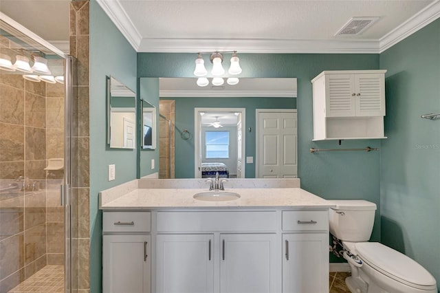 bathroom featuring toilet, crown molding, and walk in shower