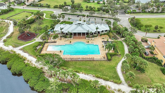 birds eye view of property featuring a water view