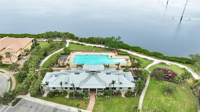 birds eye view of property featuring a water view