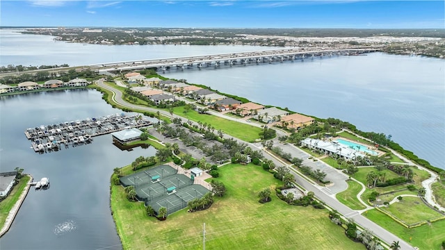 drone / aerial view with a water view