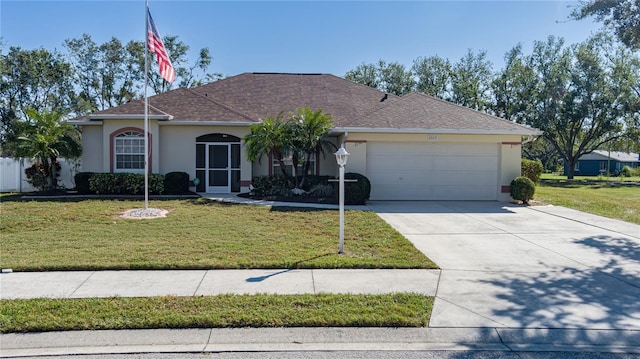 4569 35th Avenue Cir E, Palmetto, FL 34221 - ranch-style home with stucco siding, a garage, a front lawn, and driveway