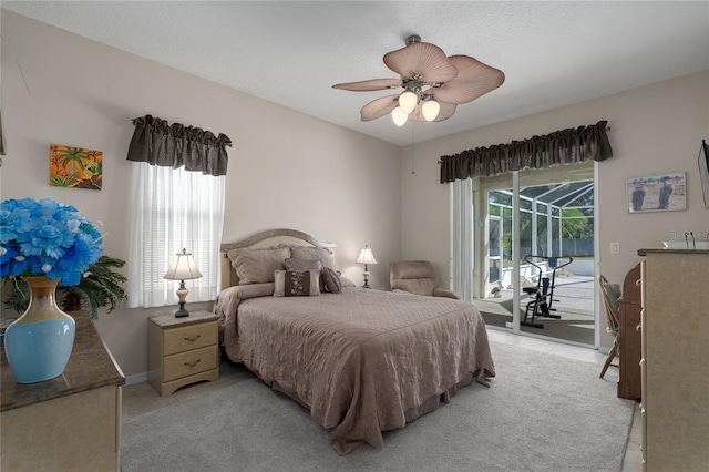 4569 35th Avenue Cir E, Palmetto, FL 34221 - bedroom with access to exterior and ceiling fan