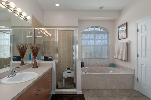 4569 35th Avenue Cir E, Palmetto, FL 34221 - bathroom featuring a garden tub, vanity, a stall shower, recessed lighting, and tile patterned flooring