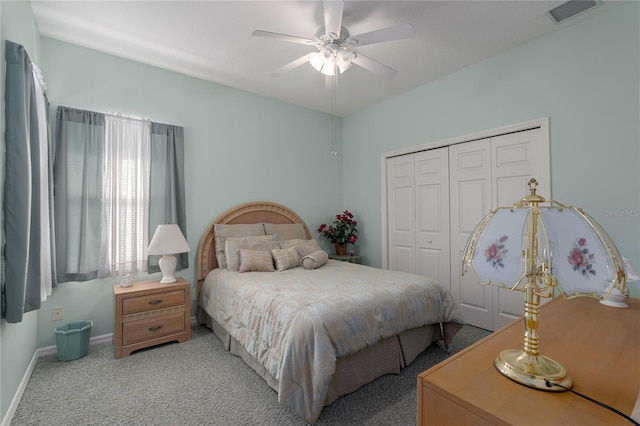 4569 35th Avenue Cir E, Palmetto, FL 34221 - bedroom featuring carpet, a closet, a ceiling fan, and baseboards