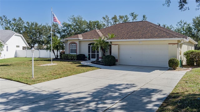4569 35th Avenue Cir E, Palmetto, FL 34221 - view of front of home featuring stucco siding, an attached garage, concrete driveway, and a shingled roof