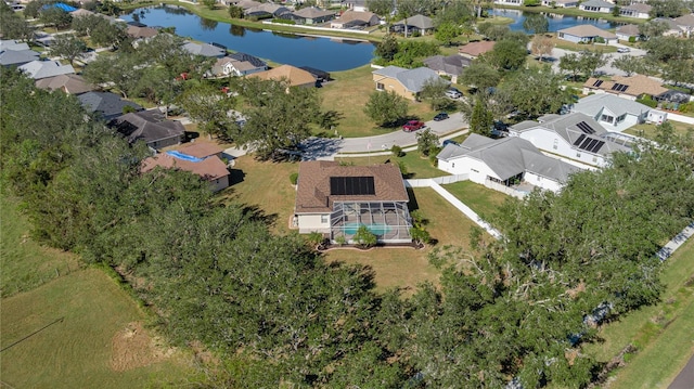 drone / aerial view with a water view