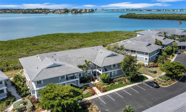 bird's eye view with a water view