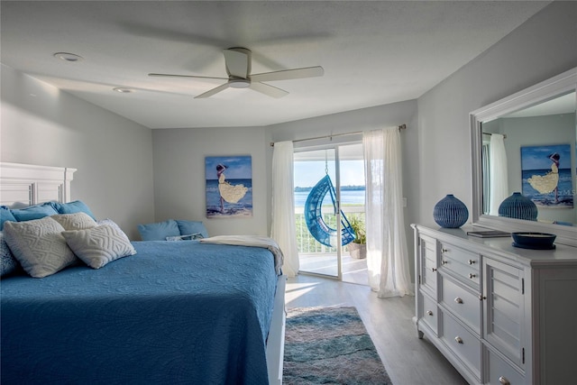 bedroom with access to outside, ceiling fan, and light wood-type flooring