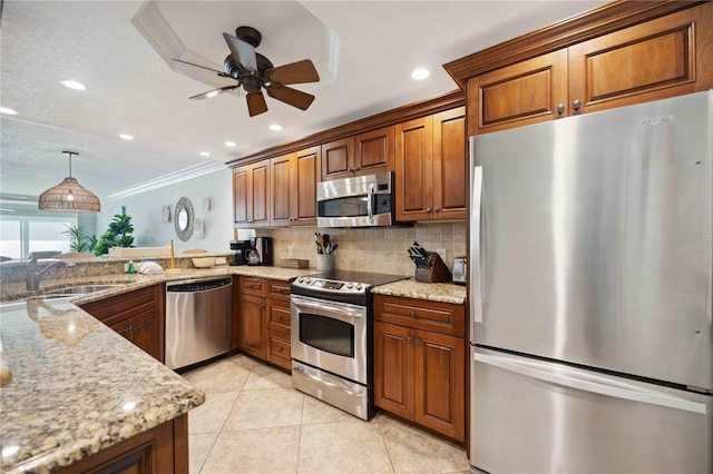 6140 Midnight Pass Rd Unit 407, Sarasota, FL 34242 - kitchen featuring decorative light fixtures, light stone countertops, stainless steel appliances, ornamental molding, and light tile patterned floors