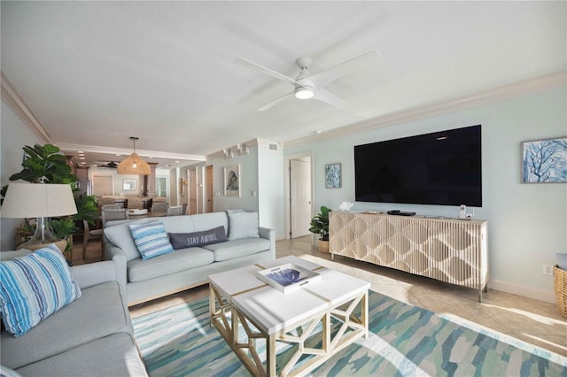 6140 Midnight Pass Rd Unit 407, Sarasota, FL 34242 - tiled living room featuring ceiling fan and crown molding