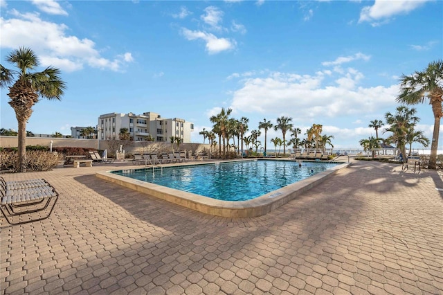 6140 Midnight Pass Rd Unit 407, Sarasota, FL 34242 - view of swimming pool with a patio