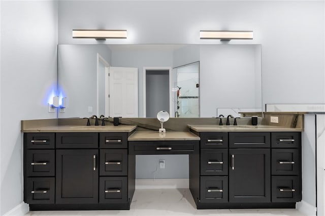 bathroom with vanity and an enclosed shower