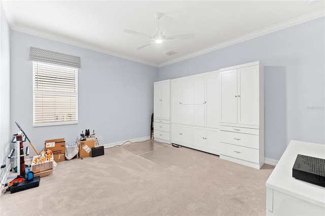 interior space featuring ceiling fan and ornamental molding