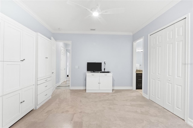 unfurnished bedroom featuring two closets, light colored carpet, ceiling fan, and ornamental molding