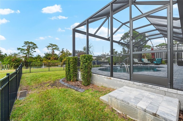 view of yard with a lanai, a patio, and a fenced in pool