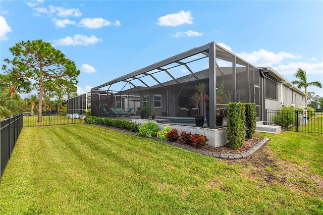 view of yard featuring glass enclosure