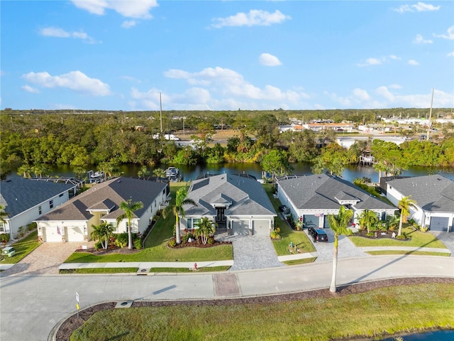 bird's eye view with a water view