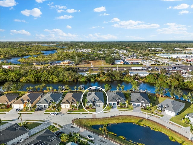 drone / aerial view with a water view