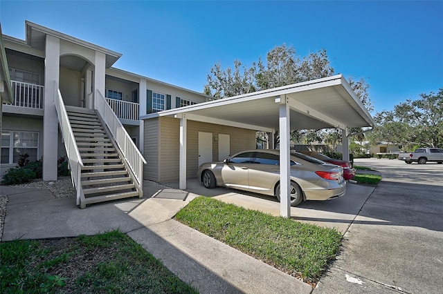 view of car parking with a carport