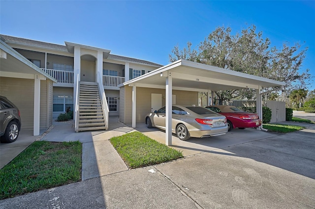 view of front of home with a carport