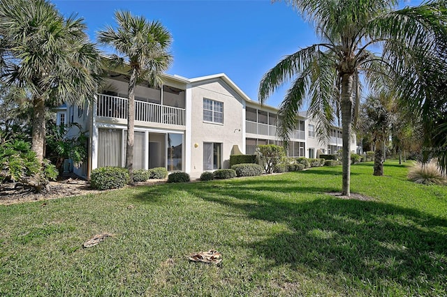 exterior space featuring a front lawn